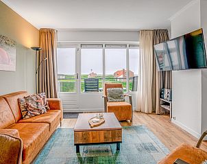 Stijlvolle zithoek in Appartement Juliana 136 Eiland en Zeezicht, De Koog, Texel met panoramisch uitzicht.
