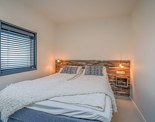 Comfortabele slaapkamer met tweepersoonsbed in Het Bospad - Brink 15, De Koog, Texel.