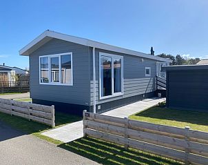 Chalet Bregkoog 94 auf Texel. Ferienhaus mit groem Auenbereich und Blick auf den Park in De Koog, Wadden Islands.