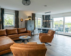 Gemtliches Wohnzimmer von Landhuis De Wije Blick, Ferienhaus in De Koog Texel, mit moderner Einrichtung.
