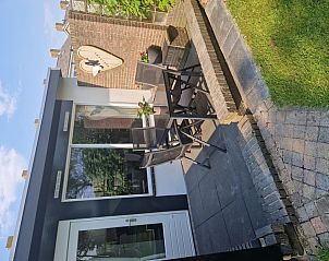 Terras van vakantiehuis Zeelucht in De Koog, Texel met comfortabele zitgelegenheid.