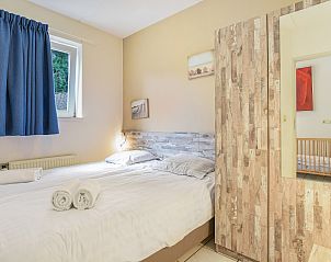 Plattegrond van de begane grond in Beach Park Texel 8-persoons villa 8EL, De Koog, Texel, met woonkamer en keuken.