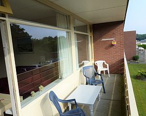 Zonnig terras bij 't Kerckeland - Appartement Kerckeland 86, De Koog, Texel, perfect voor ontspanning met uitzicht op de Waddeneilanden.