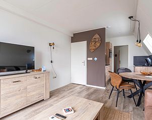 Eethoek en keuken in Appartement Anna 222, De Koog, Texel met moderne voorzieningen en gezellige sfeer.