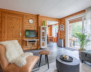 Binnenruimte met toegang tot terras in Vakantiepark Het Oude Dijkje - Hulfte, vakantiehuis De Koog, Texel.