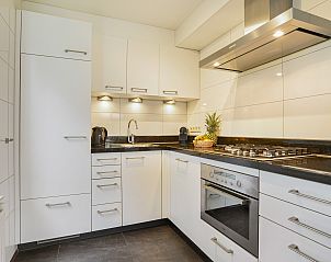 Tweepersoons slaapkamer in Beach Park Texel 6-persoons villa, De Koog, gezellig en comfortabel ingericht.