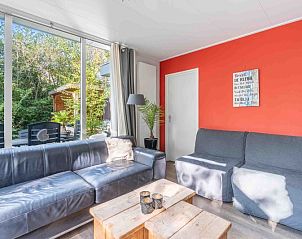 Gemtliche Sitzecke im modern eingerichteten Ferienhaus Bungalow De Nagtegaal 21, Bungalowpark De Nagtegaal, De Koog, Texel.