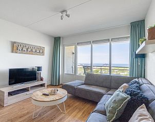 Comfortabele zithoek met panoramisch uitzicht in Appartement Juliana 102 Zeezicht, Texel.