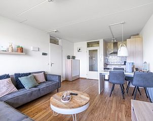 Open leefruimte met moderne keuken in Appartement Juliana 102 Zeezicht, Texel.