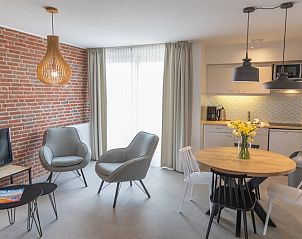 Ess- und Sitzecke im Apartment 4 Personen, De Koog, Texel, mit moderner Kche und gemtlicher Atmosphre.