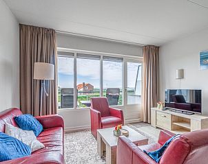 Gezellige woonkamer van Appartement Juliana 138 Eiland en Zeezicht in De Koog, Texel met uitzicht op de Waddeneilanden.