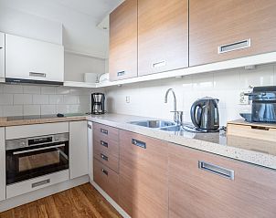 Volledig uitgeruste keuken in Vakantiehuis Kamperfoelie 47 De Koog Texel met moderne apparatuur.