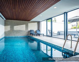 Luxurise Familienvilla mit Schwimmbad in De Koog Texel. Moderner Auenbereich mit Terrasse und Garten, ideal fr einen erholsamen Urlaub.