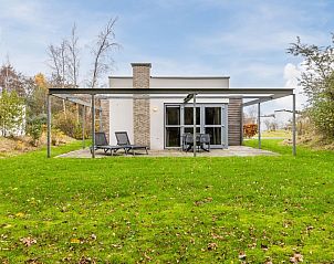 Schilpbanck 6 bungalow in De Koog, Texel met terras en groene omgeving, ideaal voor vakantie op de Waddeneilanden.