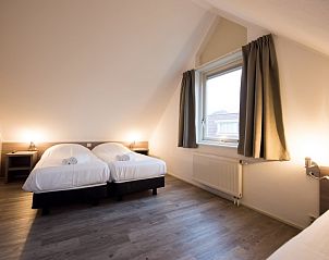 Ruime tweede slaapkamer in Villa 8, De Koog, Texel, ideaal vakantiehuis op de Waddeneilanden.