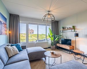 Stijlvolle binnenruimte van Appartement Juliana 044 Eiland en Zeezicht, De Koog, Texel met moderne inrichting.