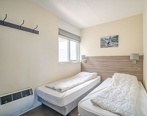 Tweede slaapkamer met twee eenpersoonsbedden in Appartement Juliana 132 Eilandzicht, De Koog, Texel.