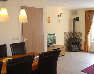 Dining room and sitting area in 6-pers. Vacation home with Sauna in De Koog, Texel, Wadden Islands.