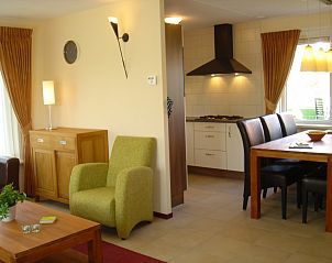 Open kitchen and dining area in 6-pers. Vacation home with Sauna in De Koog, Texel, Wadden Islands.