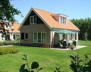 Terrace and garden at 6-pers. Vacation home with sauna in De Koog, Texel, Wadden Islands.