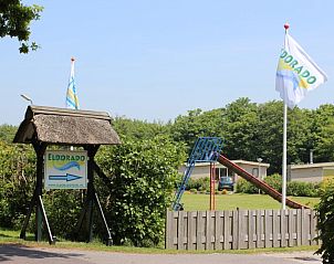 Entrance to vacation park in De Koog, Texel, Wadden Islands with 6-pers. Vacation home with sauna.