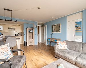Open keuken en woonkamer van Appartement Juliana 076 Eilandzicht, De Koog, Texel met moderne inrichting.
