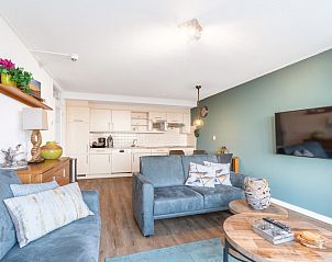 Open keuken en woonkamer in Appartement Juliana 124 Eilandzicht, De Koog, Texel met moderne inrichting.