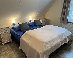 Ruime slaapkamer in Landgoed Springtij - Koetshuis 2, ideaal vakantieverblijf in De Koog, Texel.