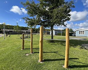 Buitenspeelplaats op Camping Coogherveld Texel, De Koog, perfect voor kinderen die de natuur van de Waddeneilanden willen ontdekken.