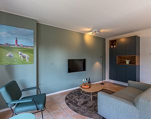 Gezellige woonkamer van vakantiehuis 16 - Zeebries in De Koog, Texel, met moderne inrichting op de Waddeneilanden.