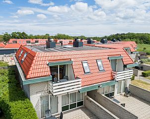 D Appartement 4 in De Koog, Texel biedt een prachtig uitzicht op de omgeving met zijn rode daken en groene natuur.