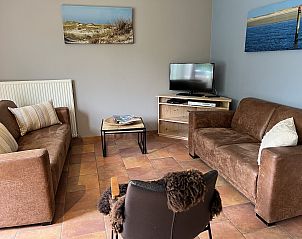 Gezellige woonkamer in Koetshuis 2, vakantiehuis in De Koog, Texel.