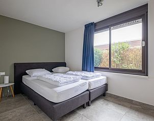 Zweites Schlafzimmer in Orchismient 20 Ferienhaus De Koog Texel mit bequemem Doppelbett.
