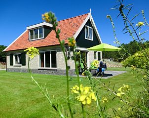Duinrand Holiday Villas Type 1 in De Koog, Texel with sunny garden and terrace.