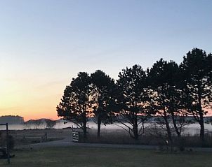Adembenemende zonsondergang bij Texel Villa Duinzicht, vakantiehuis in De Koog, Texel, Waddeneilanden.