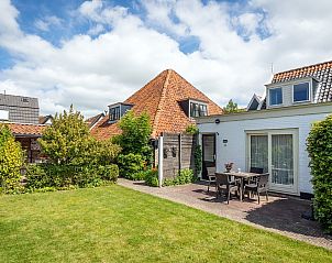 Bungalow De Tuinfluiter in Den Burg, Texel met charmante tuin en terras, ideaal vakantiehuis op de Waddeneilanden.