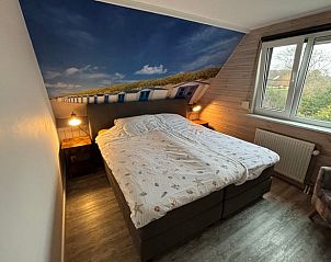 Badkamer met moderne voorzieningen in Huisje in Den Burg, Texel.