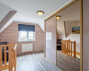 Stijlvolle badkamer met douche in Huisje in Den Burg, Texel, Waddeneilanden.