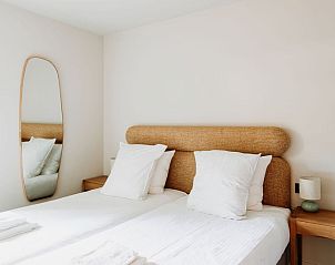 Comfortabele tweepersoonskamer in Luxe Appartement 4p, Den Burg, Texel met moderne inrichting.