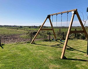 Avondschemering over de velden bij NH198 vakantiehuis Den Burg Texel.