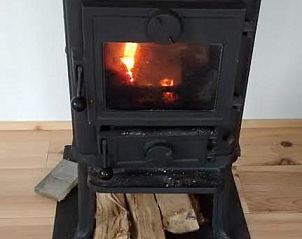 Houtkachel in Zeealsem vakantiehuis, Ballum, Ameland voor gezellige avonden.