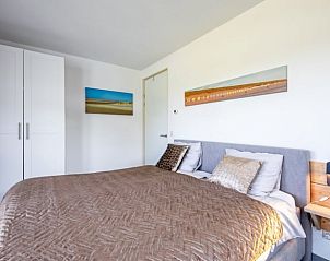 Comfortabele slaapkamer in Vakantiehuisje in Den Burg, Texel, Waddeneilanden.
