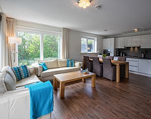 Moderne open keuken en woonkamer in Villa 3C, Den Burg Texel, vakantiehuis op de Waddeneilanden.