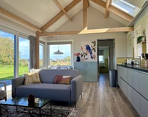 Open kitchen and living room of 45 - 't Veldje, vacation home in Texel.