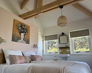 Attractive bedroom in 45 - 't Veldje, vacation home on Texel.