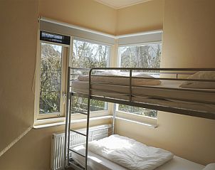 Bunk bed in child-friendly room of Wadden Sea vacation home Texel.