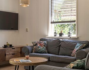 Comfortabele woonkamer in Type I - nr. 55 Marel, vakantiehuis in Oosterend Texel met moderne inrichting.