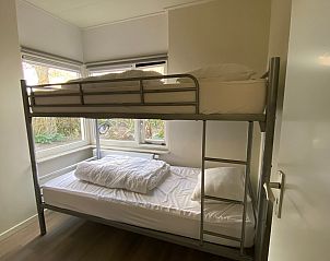 Gezellige kinderkamer met stapelbed in Vuurtoren vakantiehuis, Oosterend, Texel.