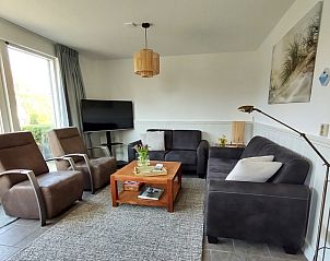 Gezellige woonkamer in Type II - nr. 37 Huismus vakantiehuis, Oosterend Texel met comfortabele zithoek.