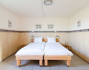 Gemtliches Schlafzimmer im Ferienhaus De Triaan, Ferienhaus auf Texel, ideal fr einen entspannten Aufenthalt.